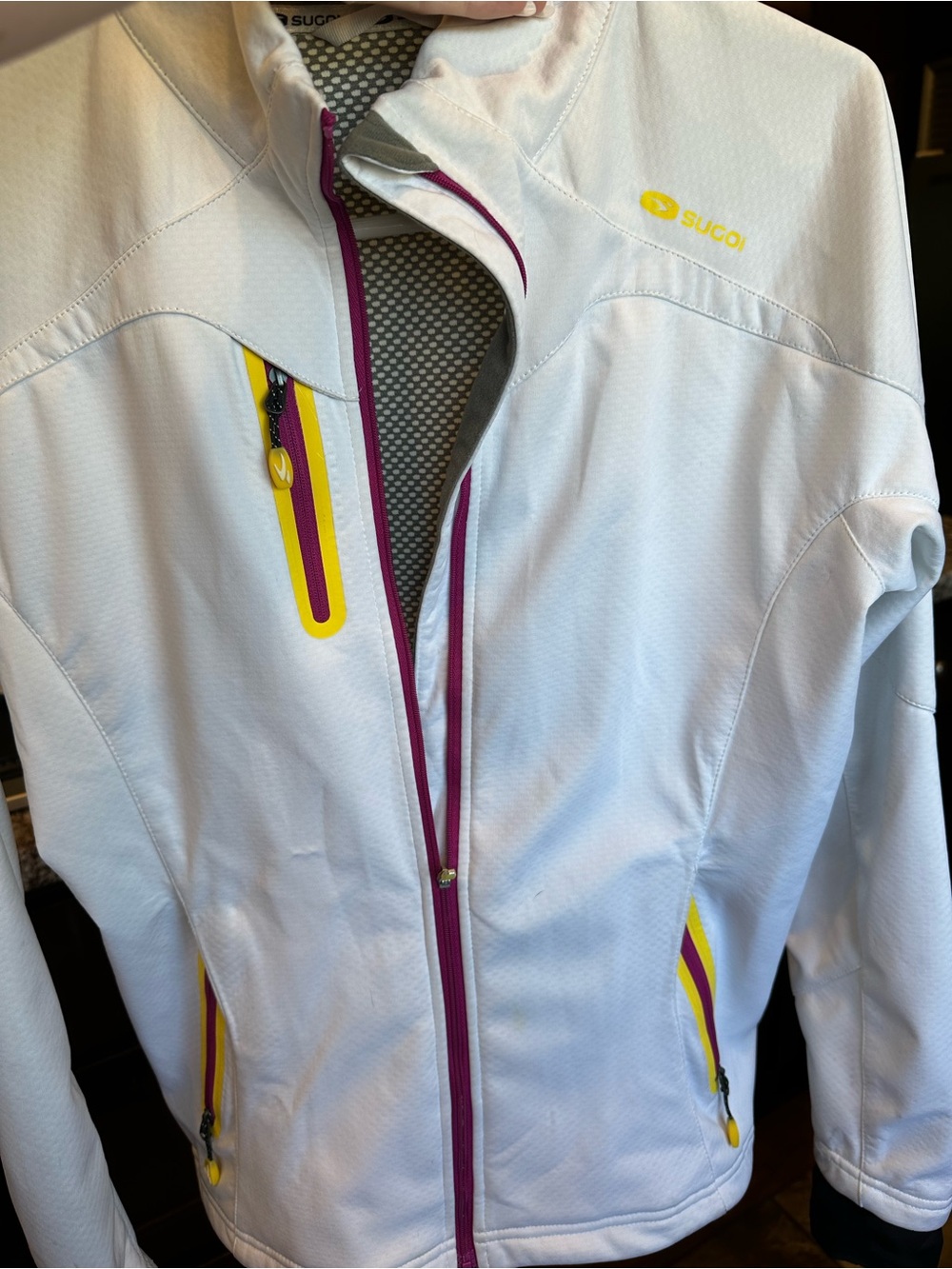 SUGOI White Ski Softshell Jacket with Yellow & Purple Accents